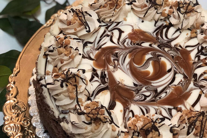 A chocolate peanut butter cheesecake by The Lovin Oven.