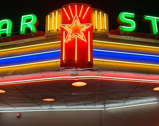 The Star Cinema’s glowing neon marquee.