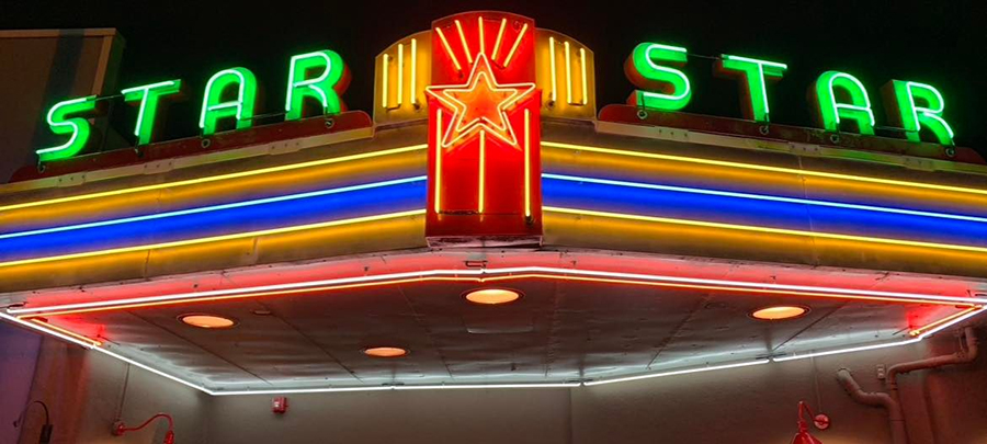 The Star Cinema’s glowing neon marquee.
