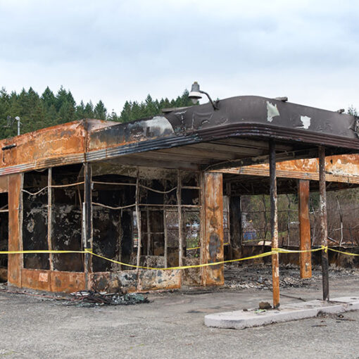 Fire consumed this former service station. Jim Kinghorn