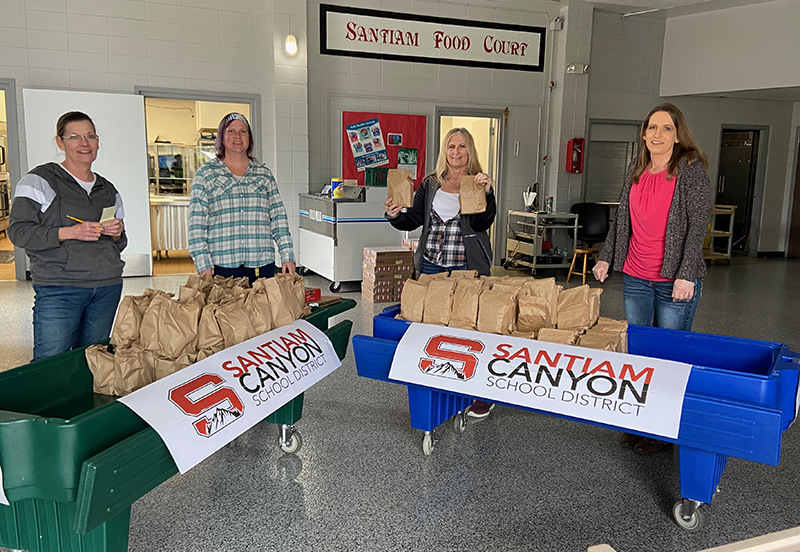 Staff at Santiam Canyon School District prepare to deliver free lunches. Submitted Photo