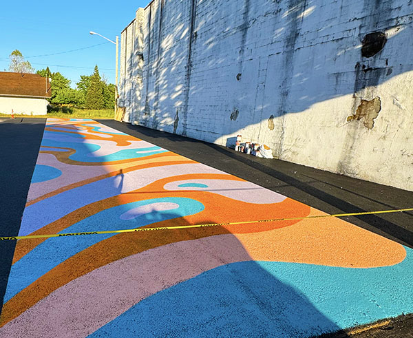 A new walkway mural has been painted at the site of the Stayton Farmers Market as part of efforts by Revitalize Downtown Stayton to freshen up and enliven the space. JULIE BOCHSLER