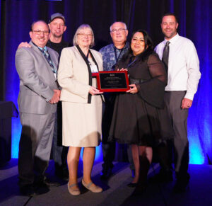 Aumsville officials, from left, Ron Harding (city administrator), Councilor Scott Lee, Councilor Della Seney, Councilor Douglas Cox, Mayor Angelica Ceja and Councilor Gregg Hudson accepting a good governance award from the League of Oregon Cities.  Submitted Photo