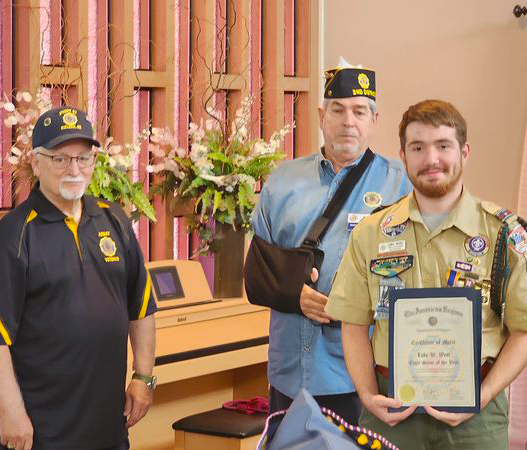 Luke West receives his Eagle Scout of the Year award from American Legion representatives Mike Snook, left, and Roger Holderby. Submitted Photo