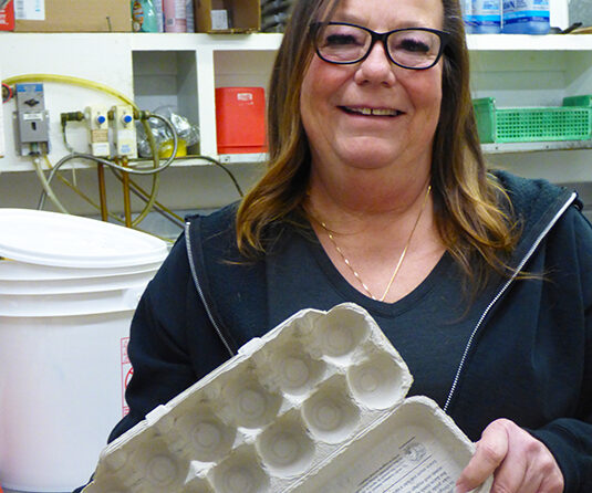 Cari Sessums, owner of The Covered Bridge Cafe, holds the evidence of the current egg shortage.