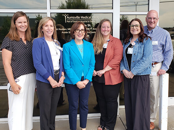 U.S. Rep. Andrea Salinas, third from left, at Santiam Hospital’s Aumsville Medical Clinic. Joining her were hospital officials , from left, Melissa Baurer, executive director of community development; Maggie Hudson, CEO and president; Cassondra Posvar, executive director of revenue & reimbursement; Abbie Proctor, primary care operations manager; and Eric Pritchard, executive director of the hospital foundation. James Day